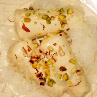 Kulfi, the Indian frozen dessert, served on a leaf.